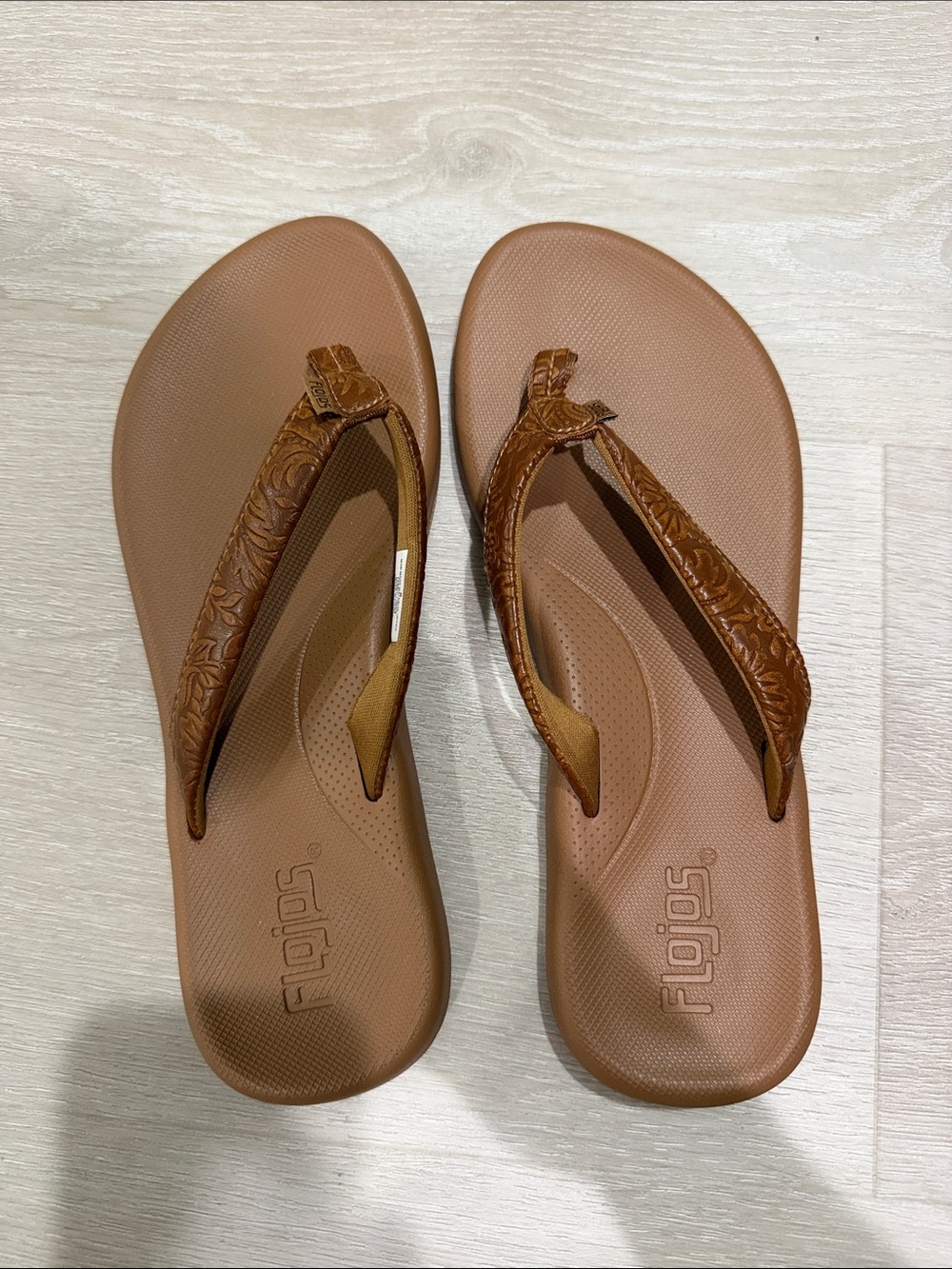 Flojos Brown Embossed Flip Flops (NWOT)